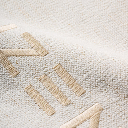 Zenest Ridge™ dog bed fabric: textured cream weave with beige geometric pattern.